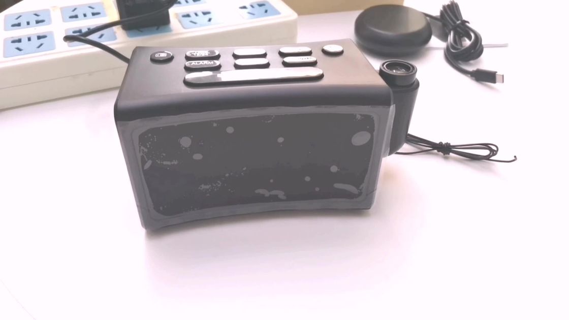 180 Degree Rotating Alarm Clock FM Radio With Creative Curved Surface